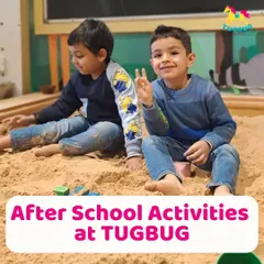Two boys enjoying some after-school fun in the sandpit, a great place for imaginative and sensory play.