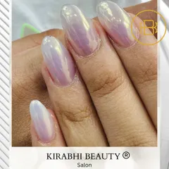 This is a beautiful iridescent chrome finish, often called a 'mermaid' or 'unicorn' effect. It shifts in the light to show subtle hints of pink, purple, and blue.