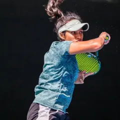 I believe in the process. These photos show me working with my coach on specific techniques and shot placements. This is the kind of detailed, hands-on training I provide.