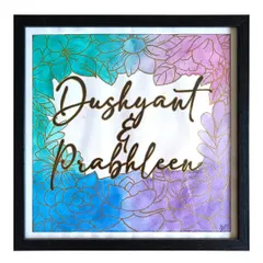 I love bringing two names together in a single piece of art. This custom watercolor nameplate for Dushyant and Prabhleen was created with a floral border and blended background, making it a unique piece of home decor that celebrates their bond.