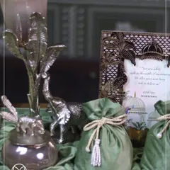 A close-up of the intricate details in one of my luxury hampers. The silver elephant, the pearl-tasseled potli, and the custom frame all tell a story of grandeur.