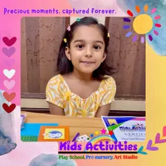 This is a precious moment captured forever. This is the happy student from our video testimonial, proudly sitting with her certificate and art kit. It's my mission to provide a platform where every child can showcase their talents and feel celebrated.