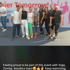 Feeling proud to stand with the Yoga, Zumba, and Aerobics team at a corporate wellness event. Combining different fitness styles creates a fun and comprehensive experience for all participants.
