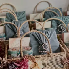 Saying "thank you" to guests should be as memorable as the event itself. We created these beautiful jute baskets as return favors, filled with premium roasted nuts, Shahi Thandai mix, and sweets, all elegantly packaged to leave a lasting impression.