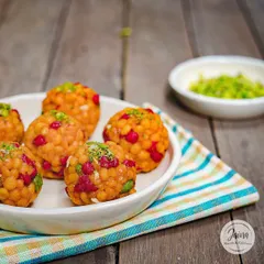 A close-up of our Jodhpuri Laddoos, showing the fine texture and colourful boondi. A perfect bite-sized treat.