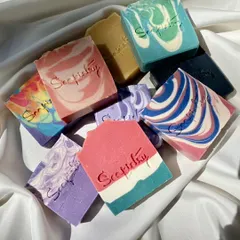 Just look at this beautiful variety! This is a glimpse into the heart of Soapistry. Each artisan soap bar is a unique piece of art, handcrafted with different colors, swirls, and designs. I use only skin-loving oils and butters to ensure they feel as good as they look.