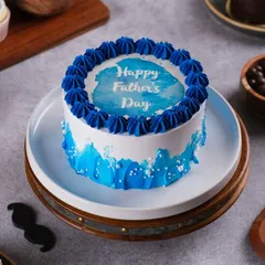 Celebrate your hero with our Father's Day cake. This one features a cool blue watercolor design and a "Happy Father's Day" message.