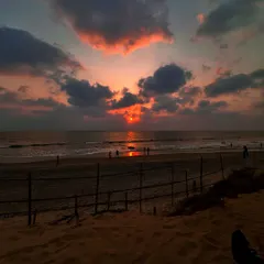 A dramatic, fiery sunset over the ocean. I always make sure we find the best vantage points to witness nature's spectacular evening shows during our travels.