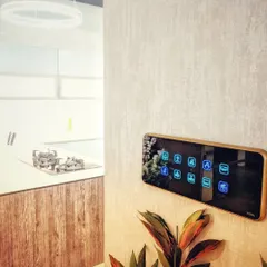 Smart technology should complement your home's design, not clash with it. This stylish Keon touch panel is installed in a modern kitchen, showing how seamlessly these controls can blend into your decor.