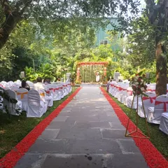 A view of the wedding aisle and mandap from the guests' perspective. This shows how I arrange seating to ensure everyone has a great view of the ceremony, with a clear and beautifully decorated path.