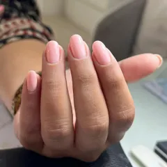 The result of a perfect Russian manicure and a simple gel overlay. Notice how clean the cuticle line is, allowing the color to be applied flawlessly for a polished, grown-out look.