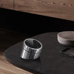 One knob, endless possibilities. This image shows my portable Smart Knob on a coffee table, a stylish and convenient way to control scenes without being tied to a wall switch.