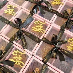 "It's a Girl!" These sweet boxes were part of a baby announcement. I love creating gifts for such happy occasions. Each box contains a giant cookie with a custom acrylic tag.