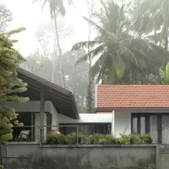 A view of the farmhouse from the coffee drying yard below. The structure is carefully sited on the slope to minimize its impact on the land while maximizing views and privacy.