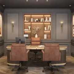 The executive desk area in the Mainee Steel Works office, designed for presence and productivity. The space features custom cabinetry with integrated lighting, classic wall paneling, and ergonomic seating, all contributing to a highly functional and sophisticated workspace.