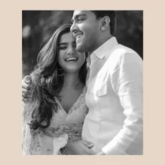 A moment of shared laughter, made even more impactful in black and white. It's a perfect example of how monochrome can amplify the authenticity of an emotion.