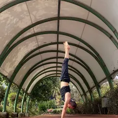 Finding symmetry and stillness in the midst of movement is a core part of my practice. This handstand, or Adho Mukha Vrksasana, is a result of consistent practice, building strength and trust in my body day by day.
