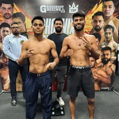 Two of our fighters at the official weigh in before their professional bouts. Making weight is the first battle, requiring discipline and dedication long before fight night.