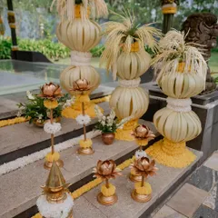 The beauty of traditional decor. These handcrafted elements and floral arrangements add a unique and elegant touch to the wedding ambiance.