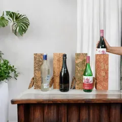 Elevate your gifting with these eco-conscious wine boxes made from patterned cork. They provide a unique and sustainable way to present a bottle of wine or spirits.