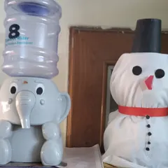 Even our water dispenser got a festive friend! A handmade snowman adds a touch of holiday cheer to every corner of the library.