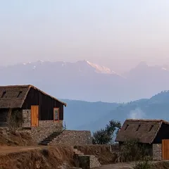 Our work in the Himalayas involves creating architecture that respects the scale and spirit of the mountains. These guesthouses in Panchachuli are built with local stone and topped with traditional thatch roofs, designed to offer serene refuge with staggering views of the snow-capped peaks.