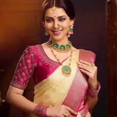 This shot showcases an alternative jewelry set from the campaign, featuring striking green stones. The styling was adjusted to complement the unique colors of the necklace while maintaining the overall bridal theme.