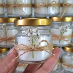 These mini jar candles are a great pocket-friendly addition to any hamper. For this order, I added a rustic touch with a jute bow and a sprig of dried baby's breath.