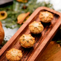 Our snowflake-topped mince pies are almost too pretty to eat. Each one is handcrafted with a buttery crust and a rich, festive filling, making them a perfect treat for Thanksgiving and Christmas.