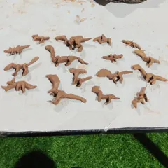 A whole herd of clay dinosaurs ready for adventure. In my kids clay classes, we often build themes around their interests, which makes the creative process even more exciting and personal for them.