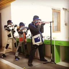 Three rifle shooters in perfect alignment during a training session. Working hard for your dreams is the only way.