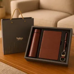 For a modern and sophisticated corporate statement, this sleek gift set is an ideal choice. It includes a premium leather-finish notebook, a matching pen, a matte thermos flask, and a keychain, all presented in a sharp, professional package perfect for new joiners or client appreciation.