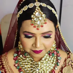 A detailed shot of the eye makeup for this bridal look. The combination of colors and sharp eyeliner creates a look that is both bold and beautiful.