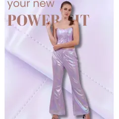 Your new power fit. This graphic highlights a stunning iridescent purple co-ord set with flared pants and a matching top.