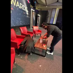 Our stagehands marking positions on the floor for the MakeMyTrip Red Carpet Awards. This ensures that furniture and speakers are placed perfectly for every segment.