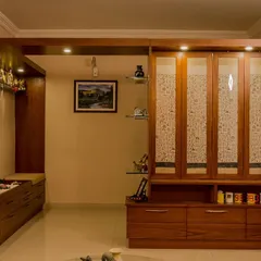 The partition unit shown in its closed state. The fabric panels create a textured, translucent wall that separates the foyer from the living area while still allowing light to pass through.