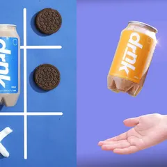 This is a playful and conceptual shot, using a tic-tac-toe board to style an Oreo-flavored drink. The levitating can on the right adds a touch of magic and makes the product feel light and fun.
