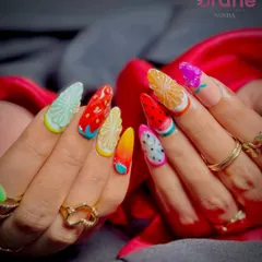 A closer look at the juicy details of the 3D fruit nail art, a fun and challenging technique we teach.