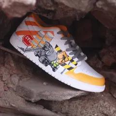 The other side of the "Under Construction" custom Nike Jordans, featuring a cement mixer truck and bold, graphic warning signs. This was a fun challenge that pushed me out of my comfort zone.
