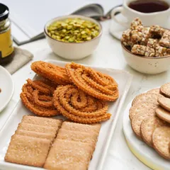 Coffee, cookies, and murukku, anyone? My delicious homemade Indian snacks are the perfect accompaniment to any hot beverage, turning a simple coffee break into a special treat.