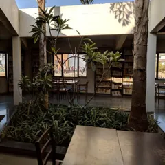 At the Vidyamandir School, we designed the library around an open-to-sky courtyard, bringing a small garden directly into the heart of the learning space. This integration of nature creates a tranquil and stimulating environment for students, promoting focus and well-being.