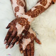 The rich, dark stain of a floral Dubai-style design. This is the kind of deep color you can expect from my henna.