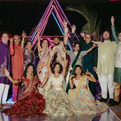 A riot of color, styled in perfect sync. The entire family, dressed in a vivid palette, celebrates together. Our styling ensures that even with a wide range of colors and styles, the overall look is harmonious.