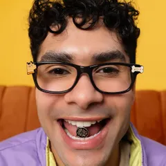 A quirky close-up from the Lenskart shoot. The styling here was about personality, using a bold purple jacket to complement the playful eyewear.