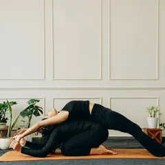 We build heat you can hold. This partner stretch combines a forward fold with a backbend, allowing for a deeper release for both individuals through mutual support.