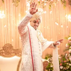 The groom's happy dance! We love capturing the groom's personality and joy, and this candid shot is full of energy and celebration.