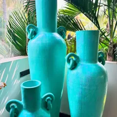 A closer look at the elegant shape and unique looped handles of the 'Del Mar' vases.