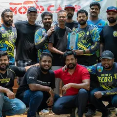 The whole crew together at the Motorcycle Tourers Association's MotoCamp. It's a great platform for riders to connect and celebrate their achievements.