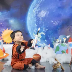 One small step for baby, one giant leap for cuteness! This astronaut theme with a planet backdrop and rocket ship is perfect for your little explorer.