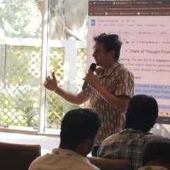 Hosting an AI & Digital Transformation Workshop for Team Computers. A speaker presents in our indoor hall, which is fully equipped for corporate presentations.